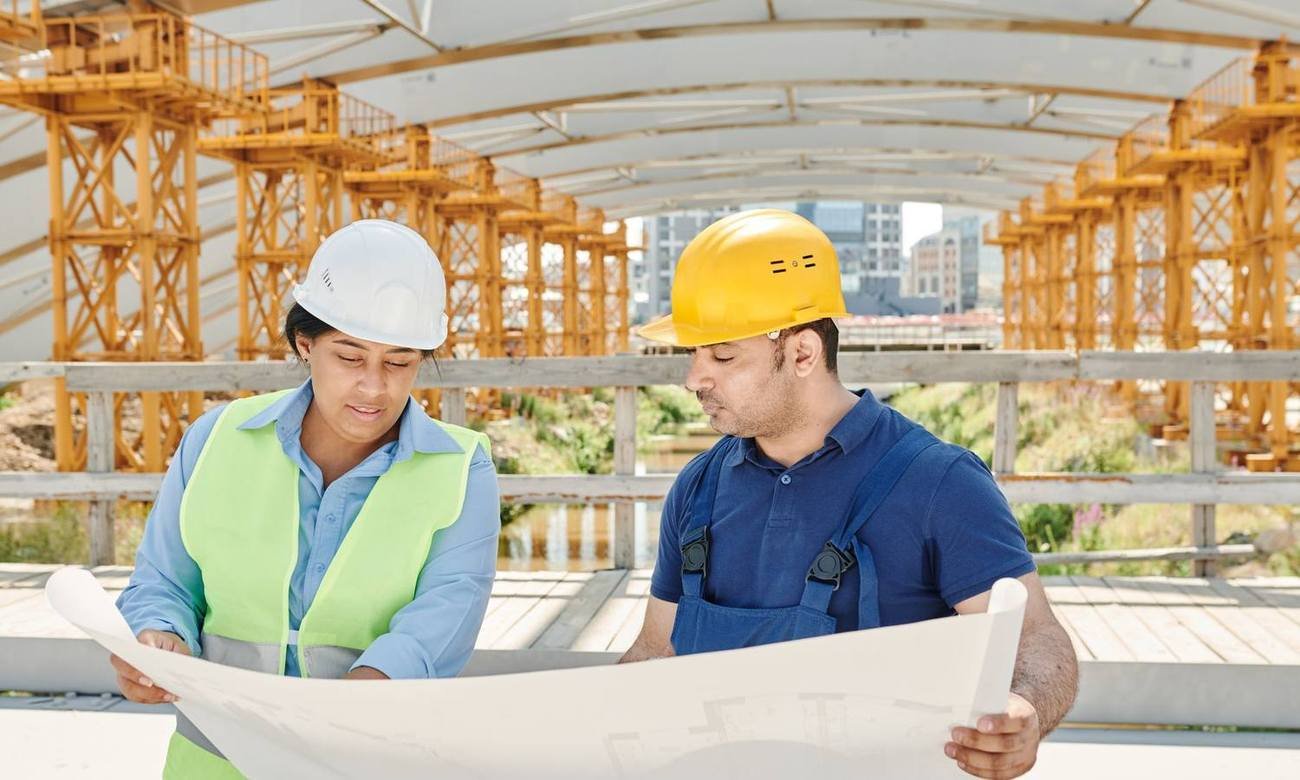 Reviewing drawings on a construction site